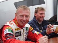 signing autographs
